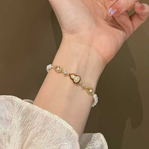 "Crimson Luck" Pearl & Enamel Charm Bracelet