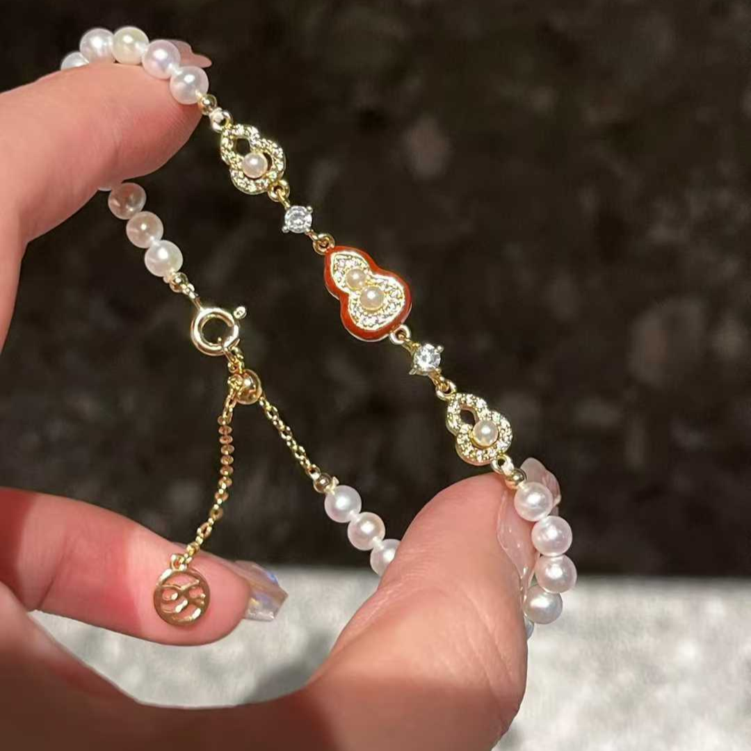 "Crimson Luck" Pearl & Enamel Charm Bracelet