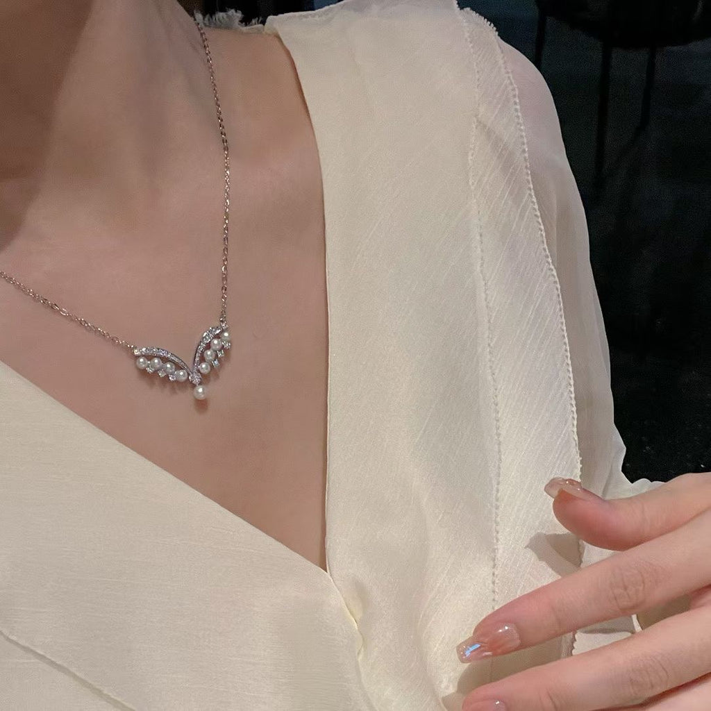 "Celestial Wings" V-Line Pearl Pendant Necklace